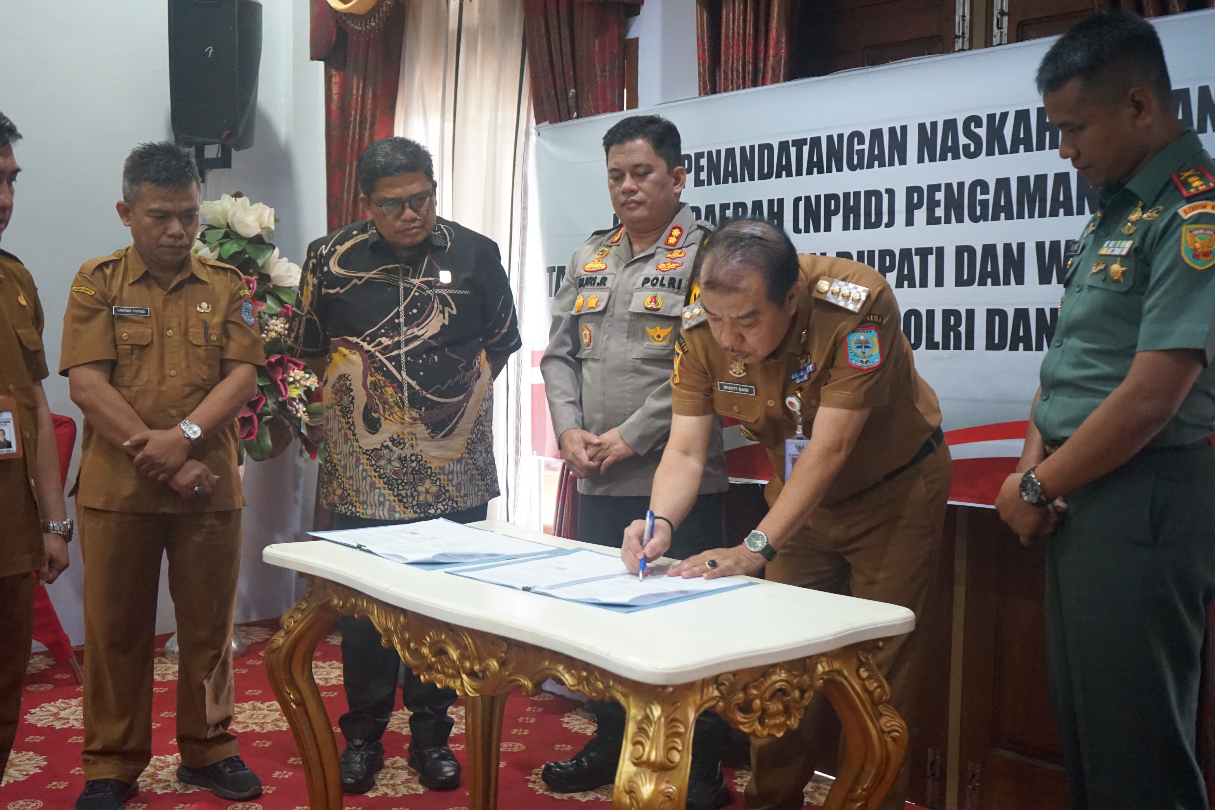 Pj Bupati Merangin Teken NPHD Pemilukada 2024 untuk Pengamanan Pemilihan Bupati dan Wakil Bupati Merangin 2024