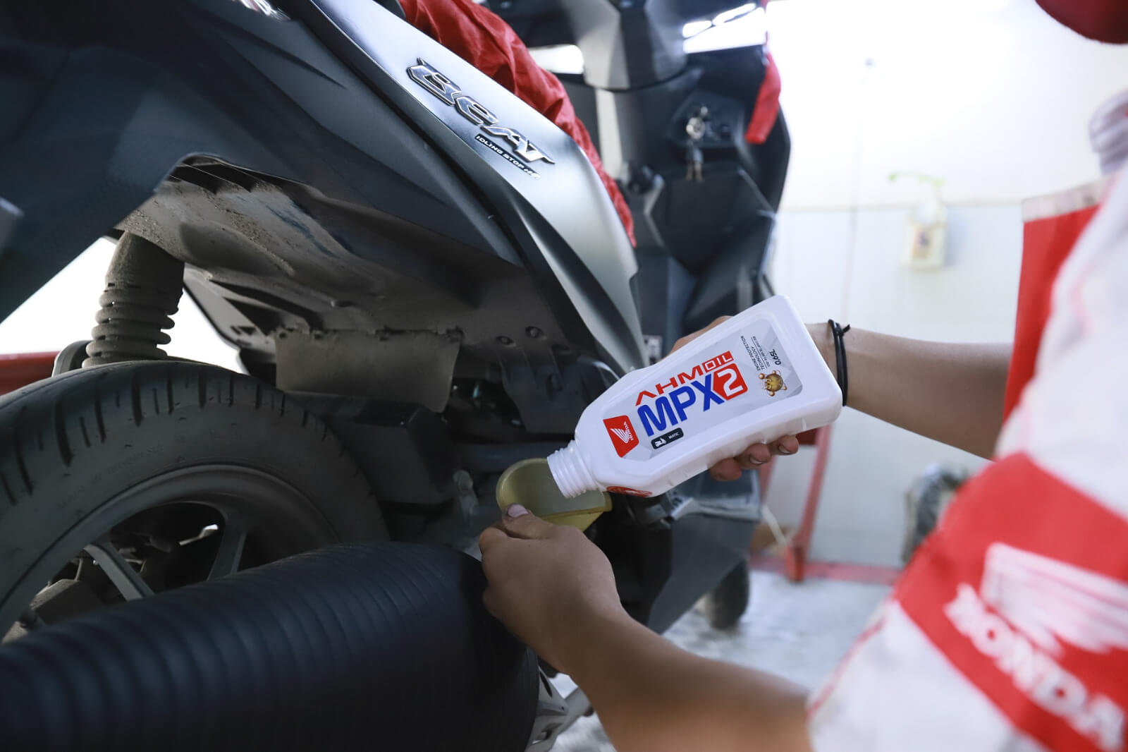 AHM Luncurkan Pelumas Skutik Honda Makin Hemat dan Tepat   
