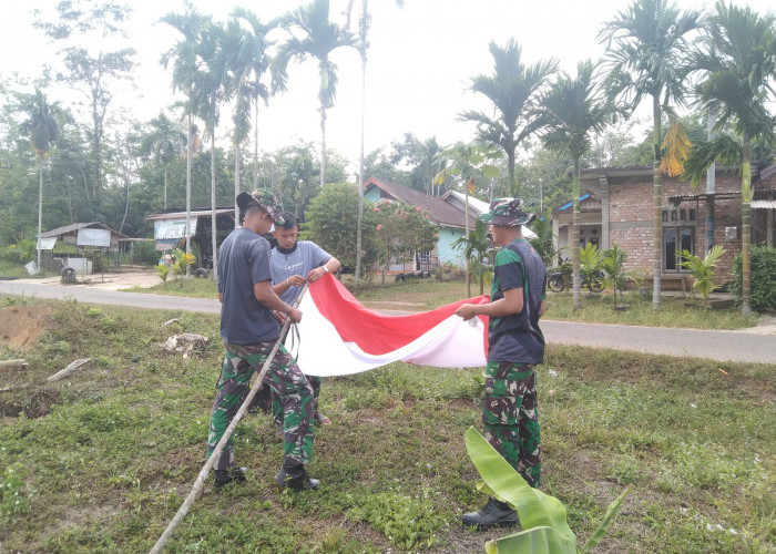 Satgas TMMD ke-121 Kodim 0415/Jambi Keliling Desa Ajak Warga Kibarkan Bendera Merah Putih