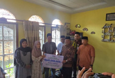 Santunan Jaminan Kematian Diserahkan, Bukti Nyata Perlindungan bagi Ketua RT